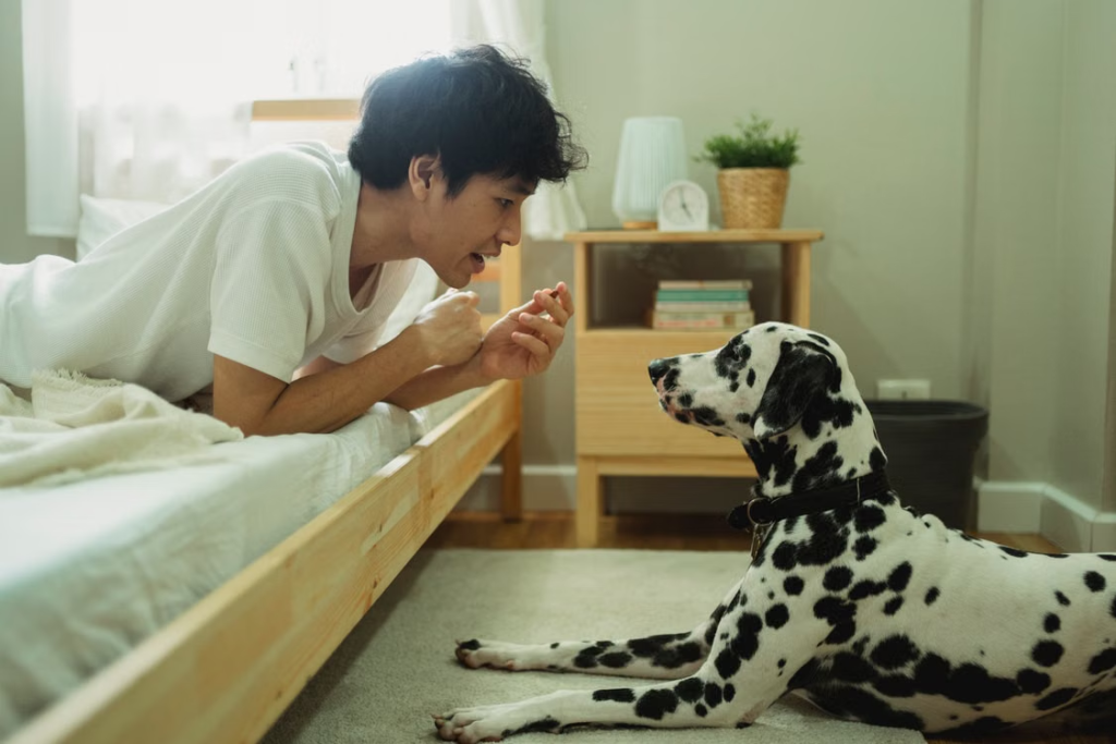 a man bonding with his dog.